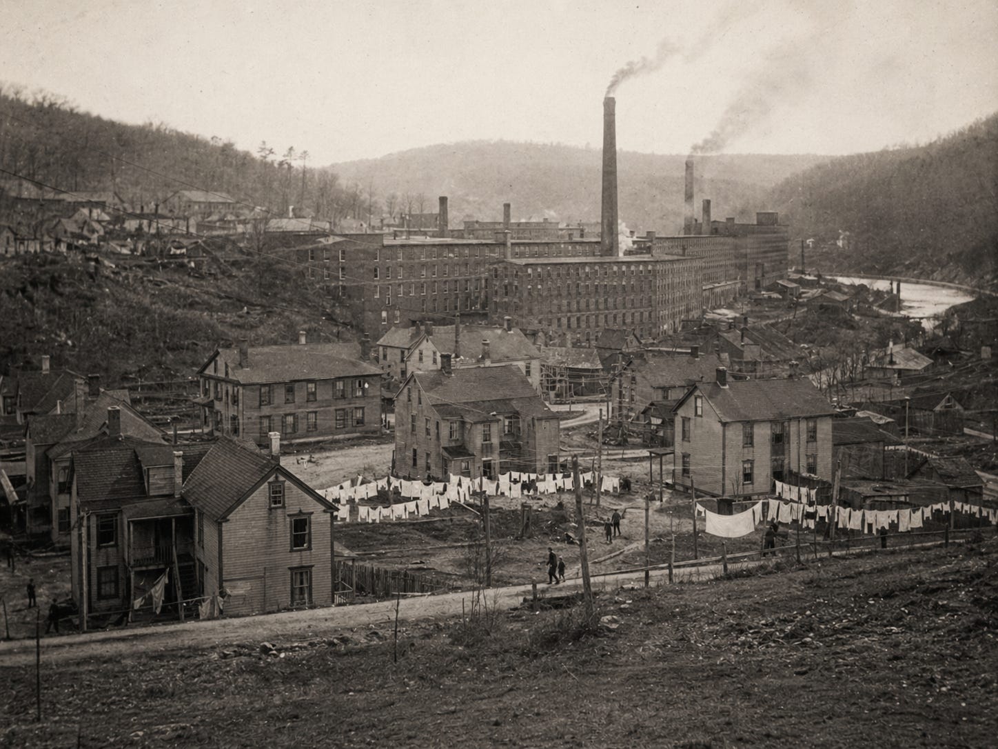 A historic panorama of the mill and village in the valley