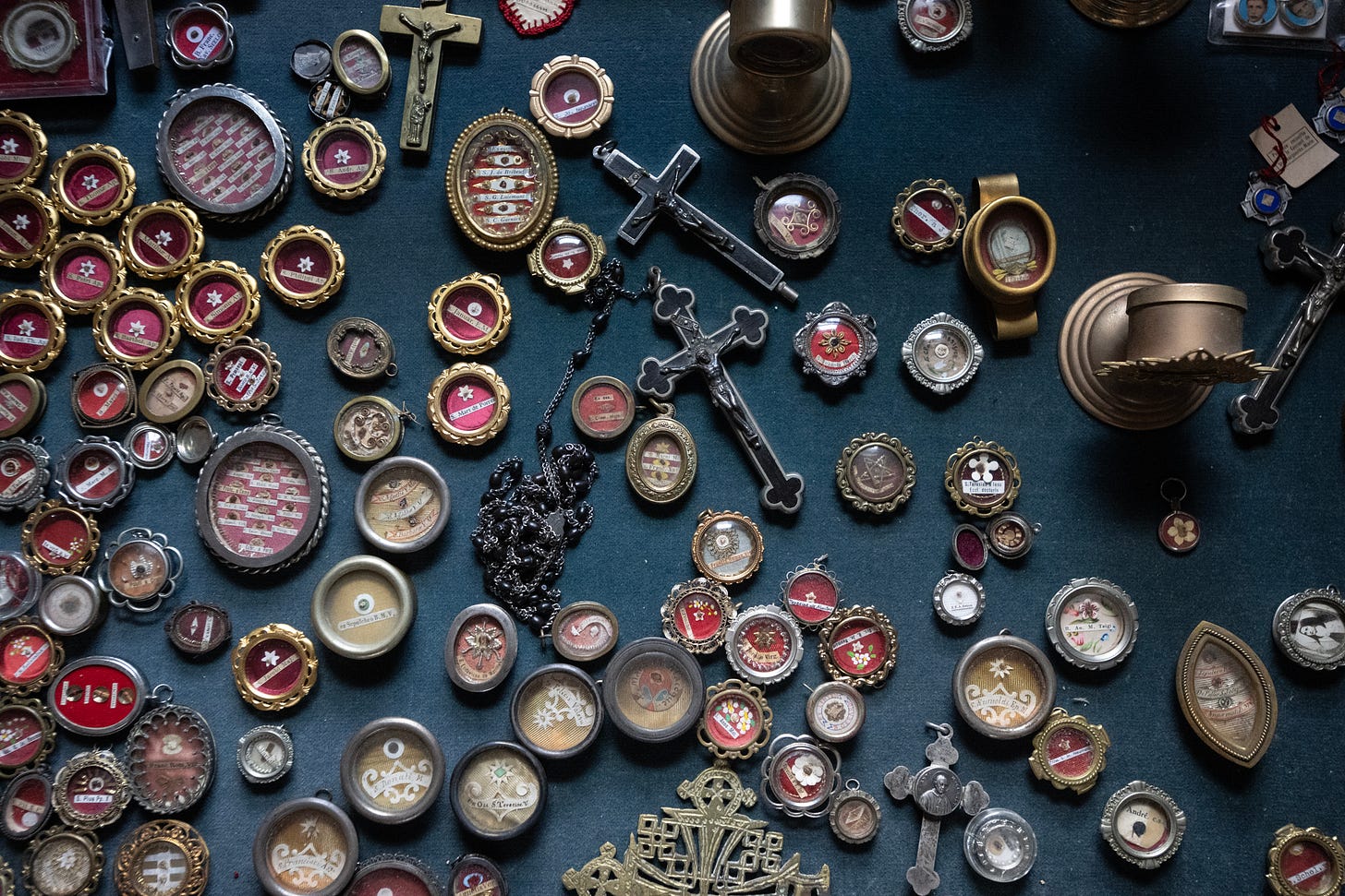 Reliquaries and devotional medals gathered inside the Motherhouse