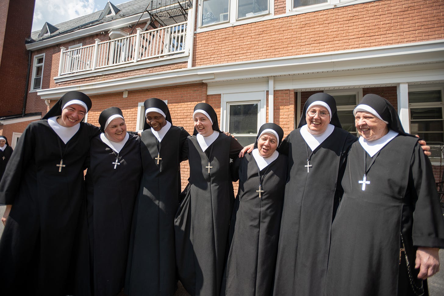 A group of Sisters gathers outside the Motherhouse