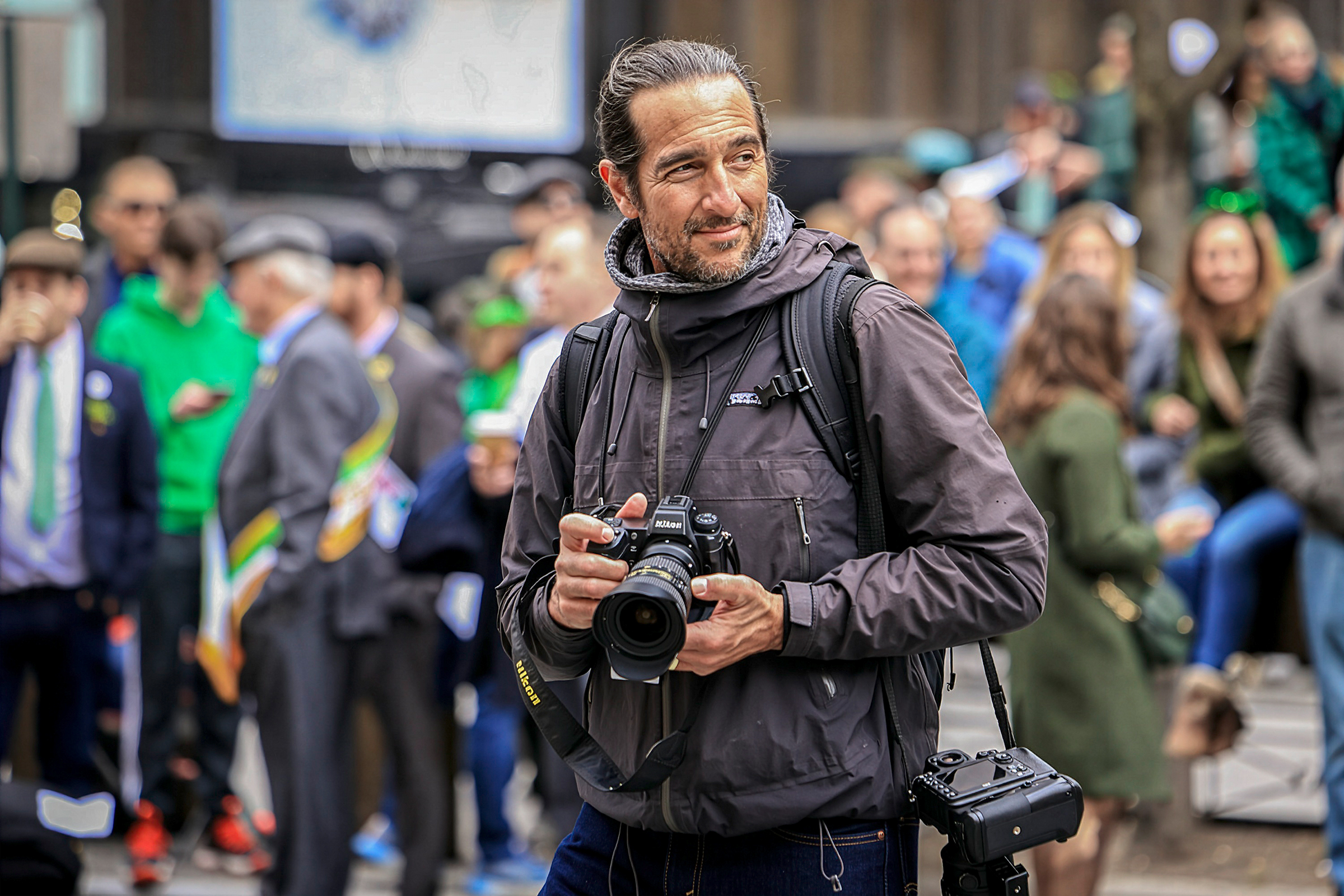 Jeffrey Bruno photographing an event on a New York City street